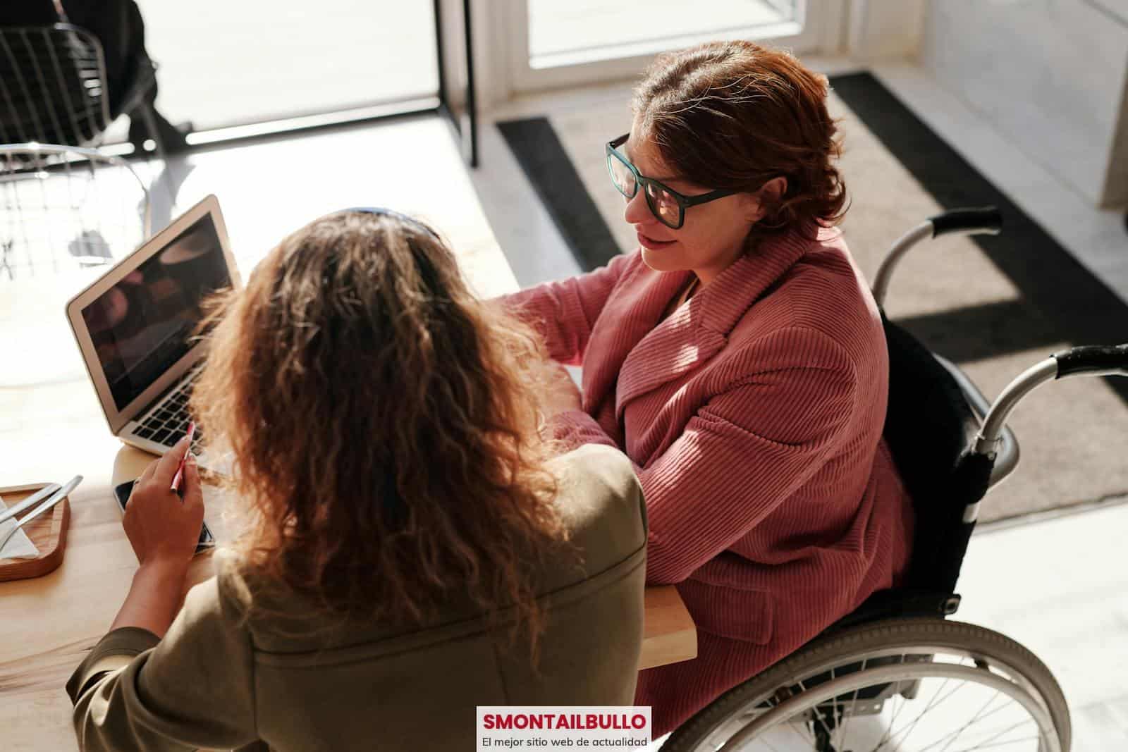 Woman in Red Sweater Wearing Black Framed Eyeglasses Sitting on Wheelchair